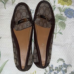 Cute Coach loafers with gold embellishment worn a couple times around the house.